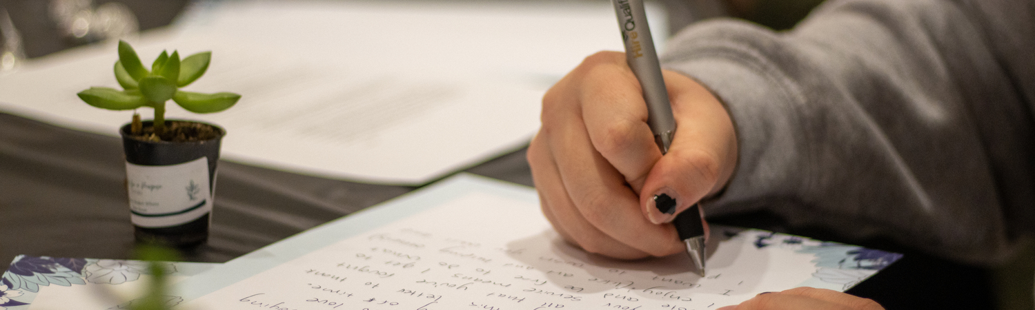 Student Writing a Letter